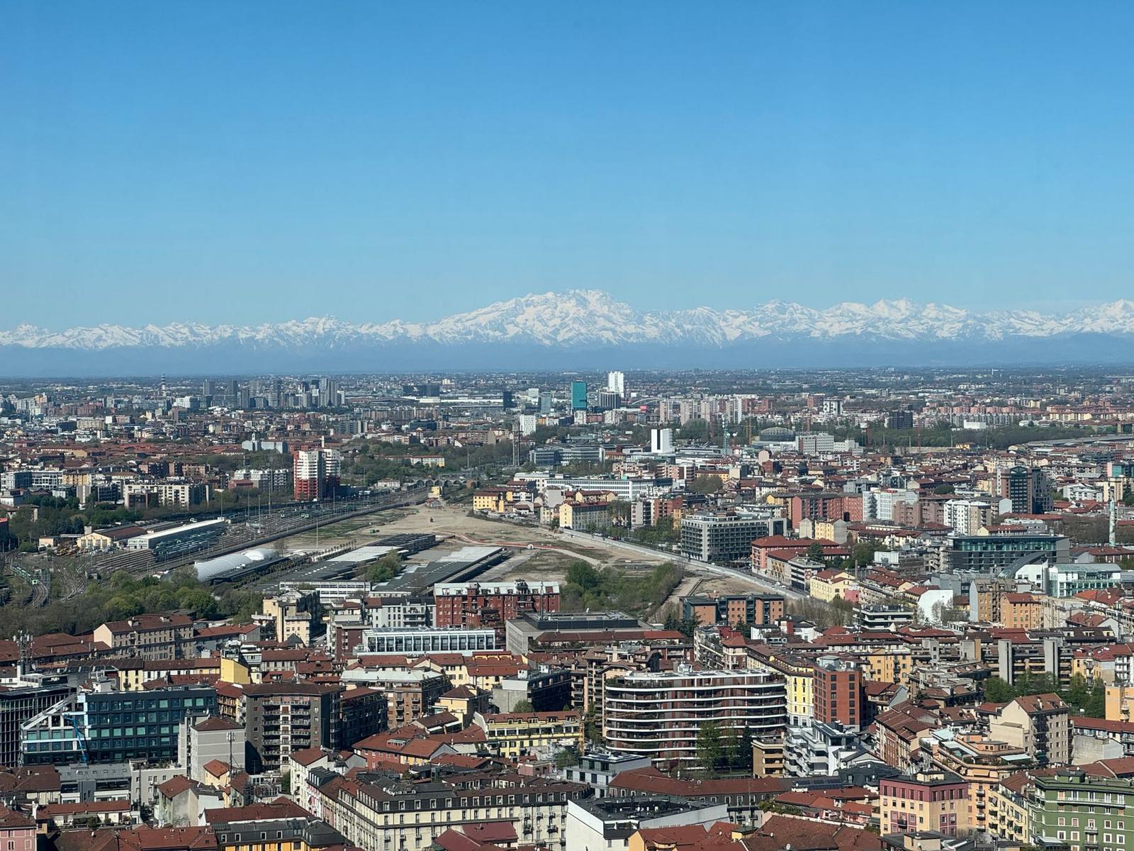 Aerial View of Milan with Distant Alps in Spring